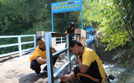 Polres Ngawi Rampungkan Perbaikan Jembatan Merah Putih Presisi di Blandongan